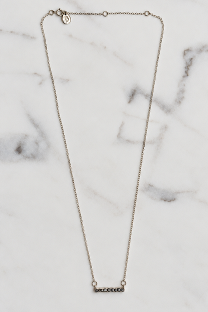 Silver plated necklace with dark grey faceted stone Bar